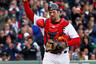Jason Varitek of the Boston Red Sox reacts to fan applause as he leaves the field  for a replacement in the ninth inning against the New York Yankees at Fenway Park in Boston Massachusetts. (Photo by Jim Rogash/Getty Images)