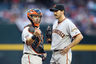 PHOENIX, AZ - Catcher Buster Posey #28 of the San Francisco Giants signals for a trainer after starting pitcher Barry Zito #75 was injured during the Major League Baseball game against the Arizona Diamondbacks.  (Photo by Christian Petersen/Getty Images)